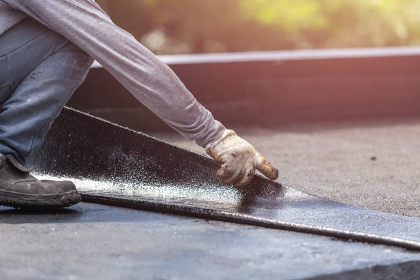 Professional Basement Waterproofing technician working in Sand Lake, MI